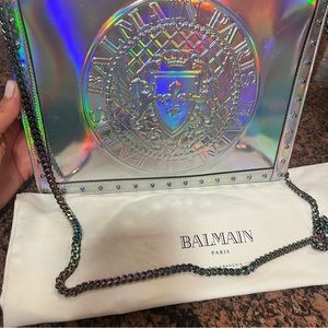 Balmain Envelope clutch comes with chain.